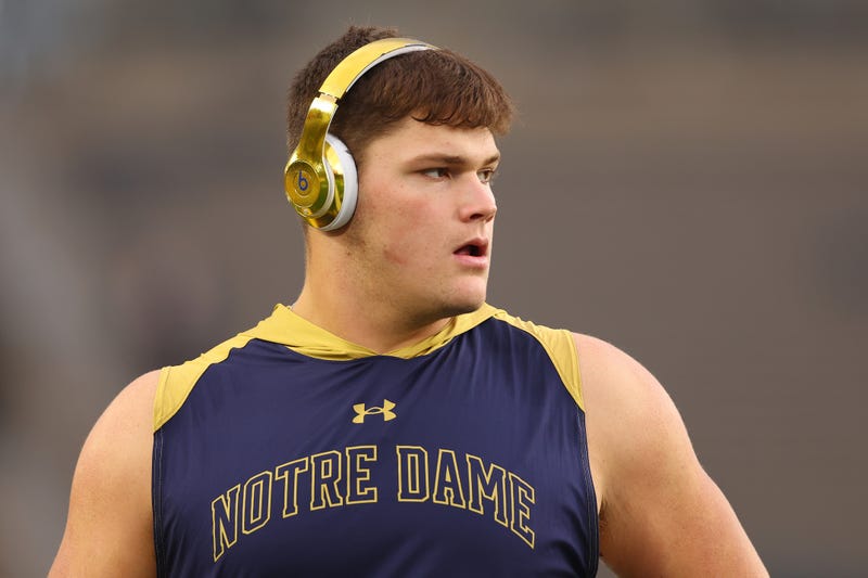 Joe Alt #76 of the Notre Dame Fighting Irish looks on prior to the game against the USC Trojans at Notre Dame Stadium on October 14, 2023 in South Bend, Indiana.