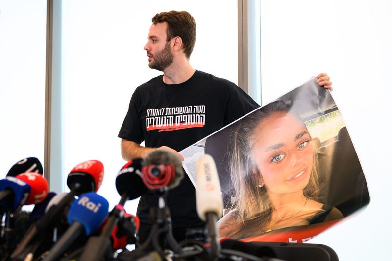 A poster of Mia Shem is displayed, during a press conference, following the release of new footage of the hostages taken by Hamas during their attack, October 17, 2023 in Tel Aviv, Israel. Ms Shem appears in the video, lying on a bed, while her arm is being bandaged. As Israel prepares to invade the Gaza Strip in its campaign to vanquish Hamas, the Palestinian militant group that launched a deadly attack in southern Israel on October 7th, worries are growing of a wider war with multiple fronts, including at the country's northern border with Lebanon. Countries have scrambled to evacuate their citizens from Israel, and Israel has begun relocating residents some communities on its northern border. Meanwhile, hundreds of thousands of residents of northern Gaza have fled to the southern part of the territory, following Israel's vow to launch a ground invasion. (Photo by Leon Neal/Getty Images)