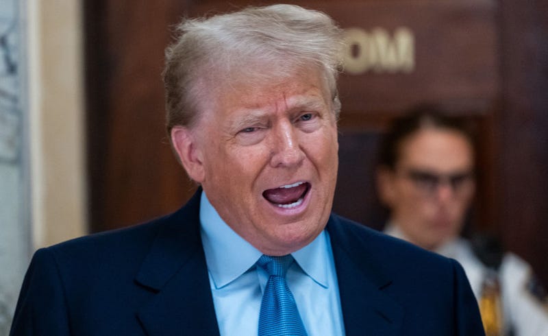 Former President Donald Trump speaks to the media during a break in his civil fraud trial at New York State Supreme Court on October 18, 2023 in New York City. The former president may be forced to sell off his properties after Justice Arthur Engoron canceled his business certificates and ruled that he committed fraud for years while building his real estate empire after being sued by Attorney General Letitia James, seeking $250 million in damages. The trial will determine how much he and his companies will be penalized for the fraud. (Photo by Spencer Platt/Getty Images)