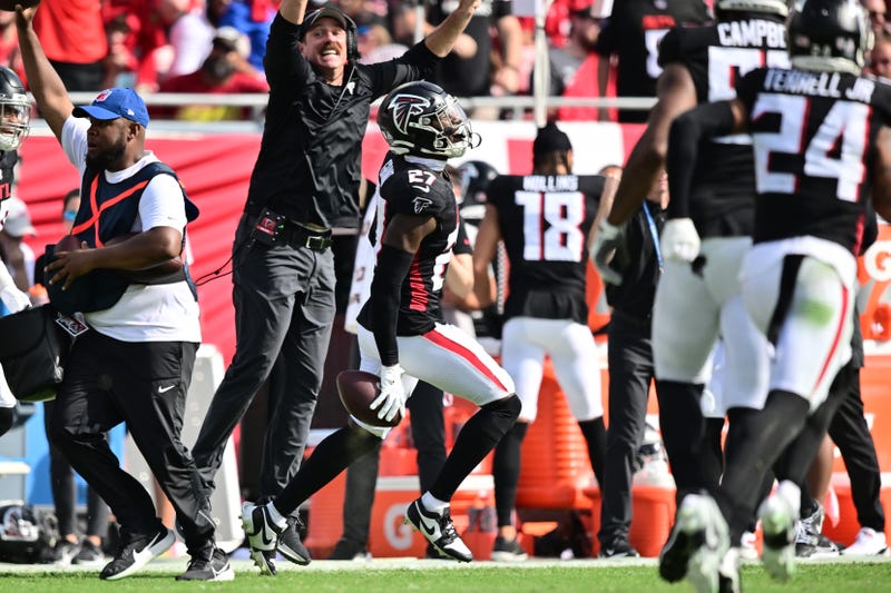 Richie Grant #27 of the Atlanta Falcons celebrates after intercepting a pass in the fourth quarter of the game against the Tampa Bay Buccaneers