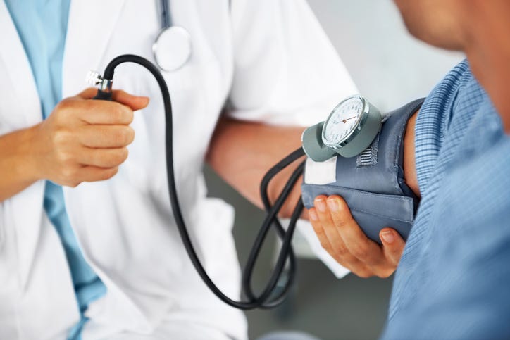 checking blood pressure