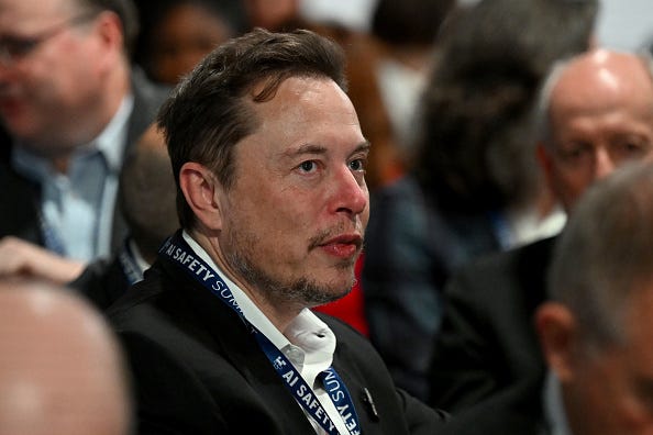 Tesla and SpaceX's CEO Elon Musk attends the first plenary session on Day 1 of the AI Safety Summit at Bletchley Park on November 1, 2023 in Bletchley, England.