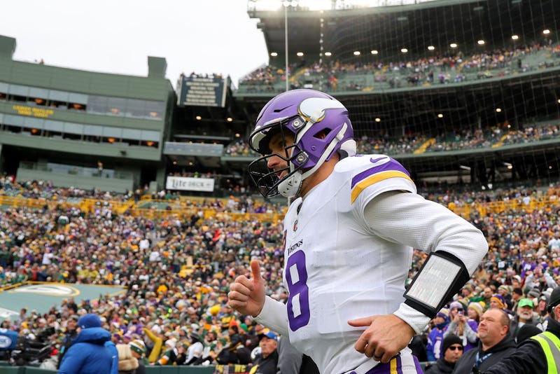 Kirk Cousins #8 of the Minnesota Vikings takes to the field prior to a game against the Green Bay Packers at Lambeau Field on October 29, 2023 in Green Bay, Wisconsin. 