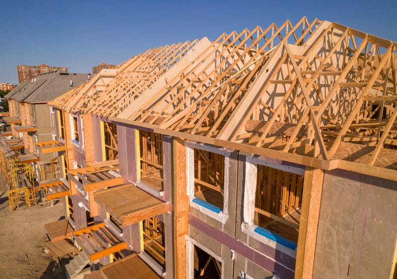 A row of new homes under construction