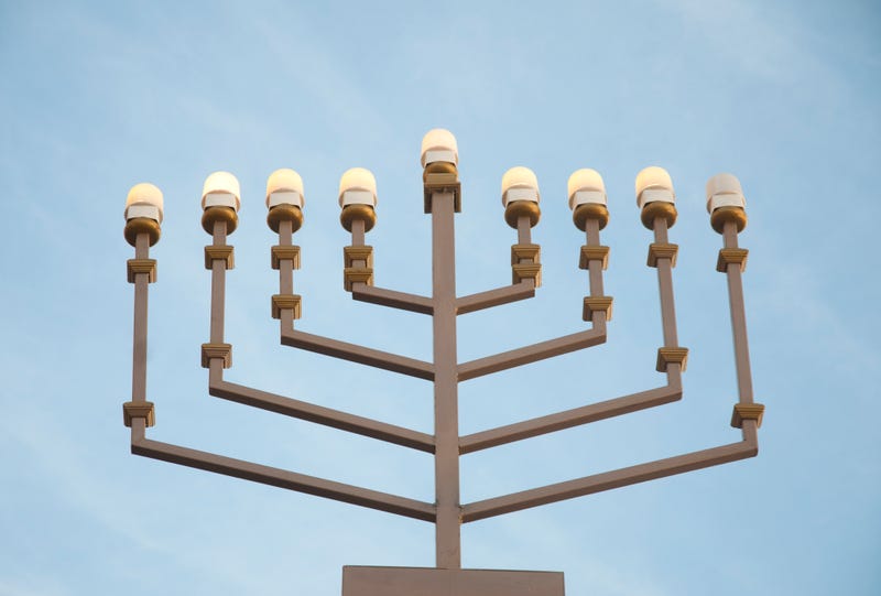 Hanukkah Menorah over blue sky