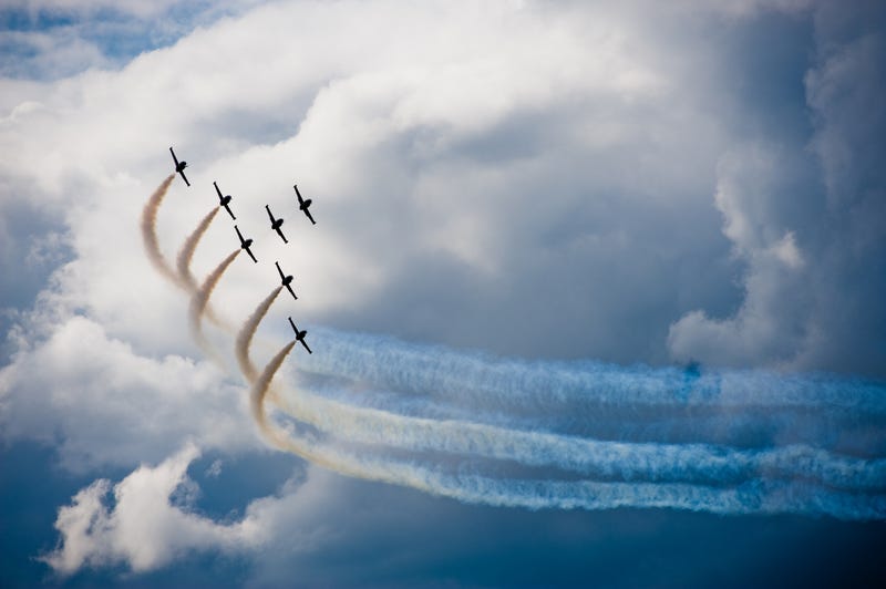 planes flying in formation for an air show