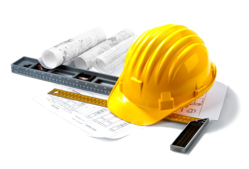 Hard hat and blueprints