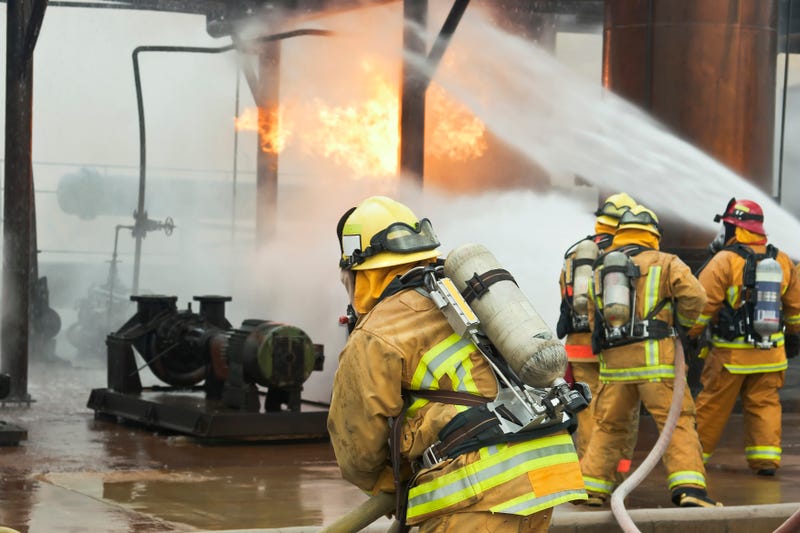 Firefighters at the scene of a natural gas explosion