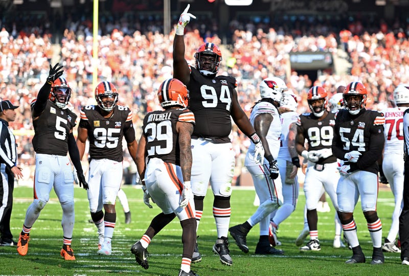 Dalvin Tomlinson #94 of the Cleveland Browns celebrates a sack against the Arizona Cardinals during the first half of the game at Cleveland Browns Stadium on November 05, 2023 in Cleveland, Ohio. 