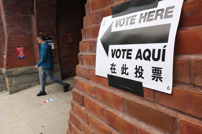 People walk out of a Brooklyn polling precinct at a YMCA where a variety of races and ballot questions in general elections are being held across the state on Nov. 07, 2023 in New York City.