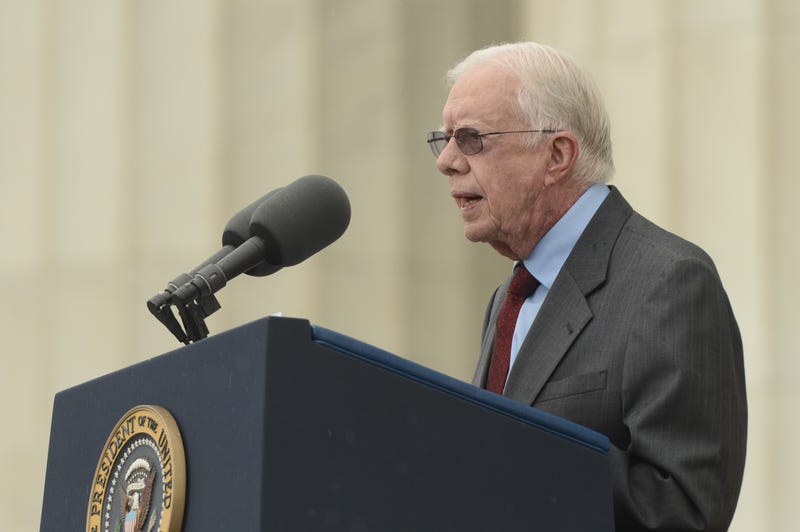 Former US President Jimmy Carter delivers remarks during the 'Let Freedom Ring' commemoration event, at the Lincoln Memorial on August 28, 2013, in Washington, DC.