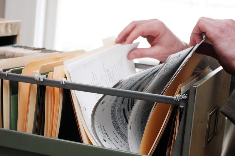 papers in a filing cabinet