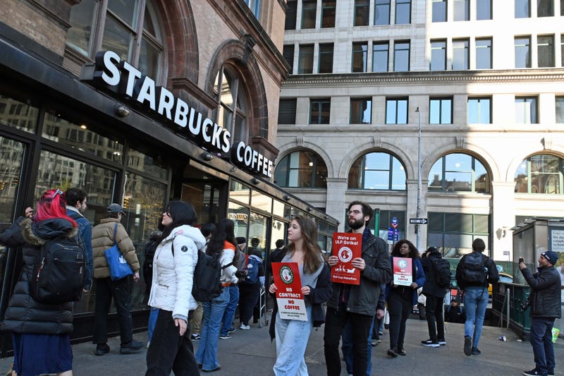 Workers picket during a strike at the Starbucks on Nov. 16, 2023