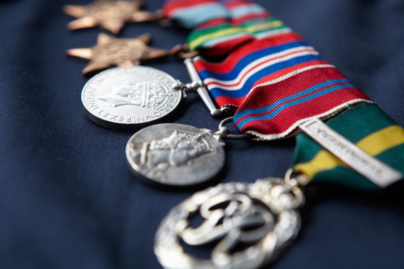 Strip of military medals in a row