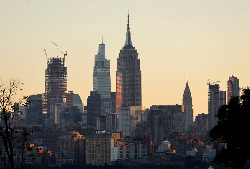 The sun rises over Manhattan on Nov. 11, 2023