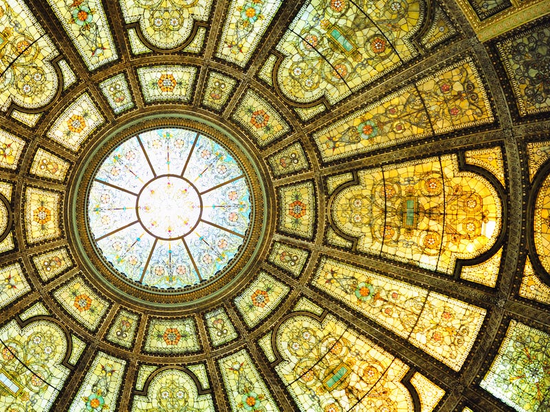 Chicago Cultural Center interior view with Healy and Millet stained glass dome in the Grand Army of the Republic rotunda