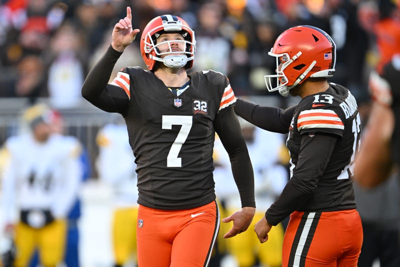 Dustin Hopkins #7 and Corey Bojorquez #13 of the Cleveland Browns celebrate after Hopkins kicked a field goal in the fourth quarter against the Pittsburgh Steelers at Cleveland Browns Stadium on November 19, 2023 in Cleveland, Ohio.