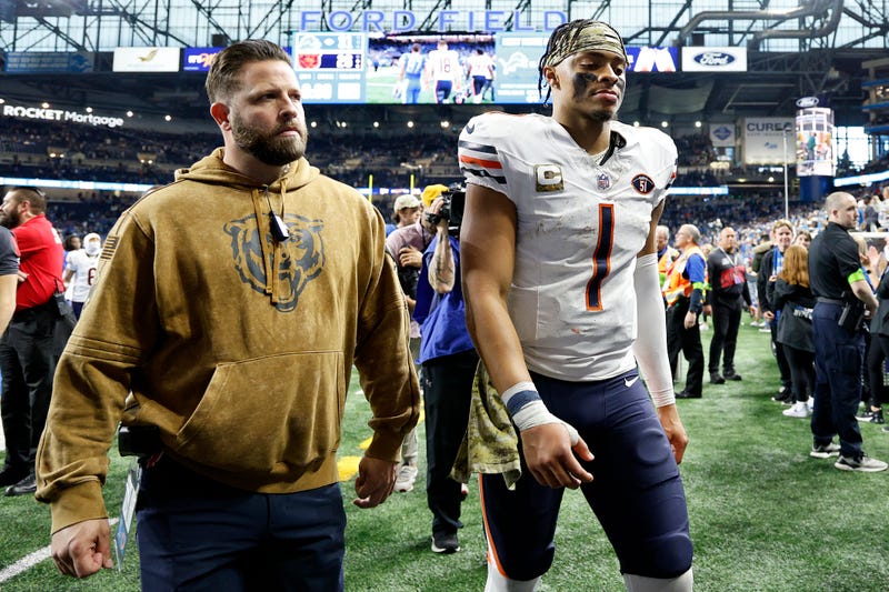 Justin Fields, of the Chicago Bears, walks off the field after a game against the Detroit Lions at Ford Field on Nov. 19, 2023, in Detroit.