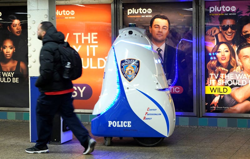 An NYPD robot equipped with cameras patrols Times Square subway station on Nov. 28, 2023