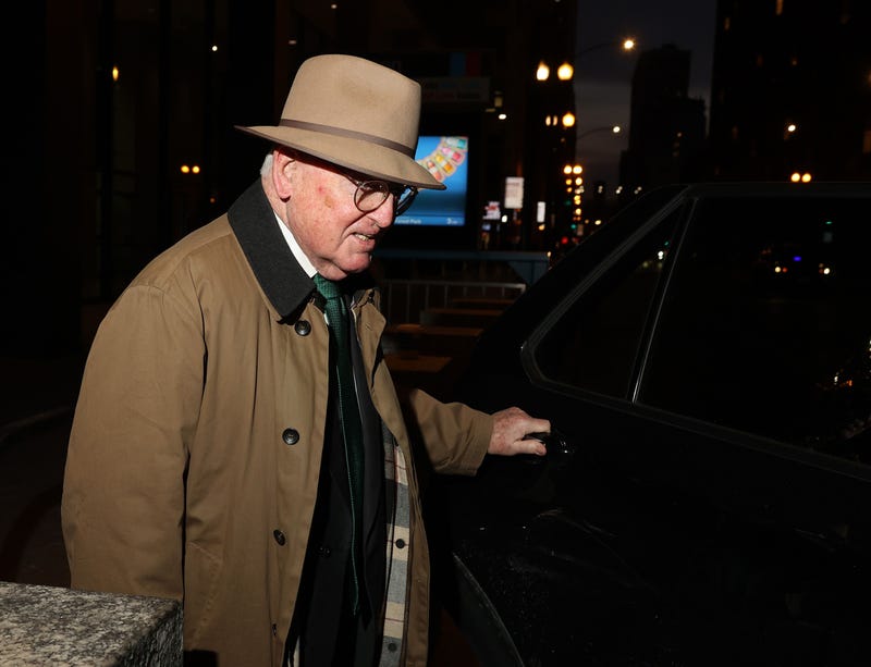 Ed Burke gets into an awaiting vehicle