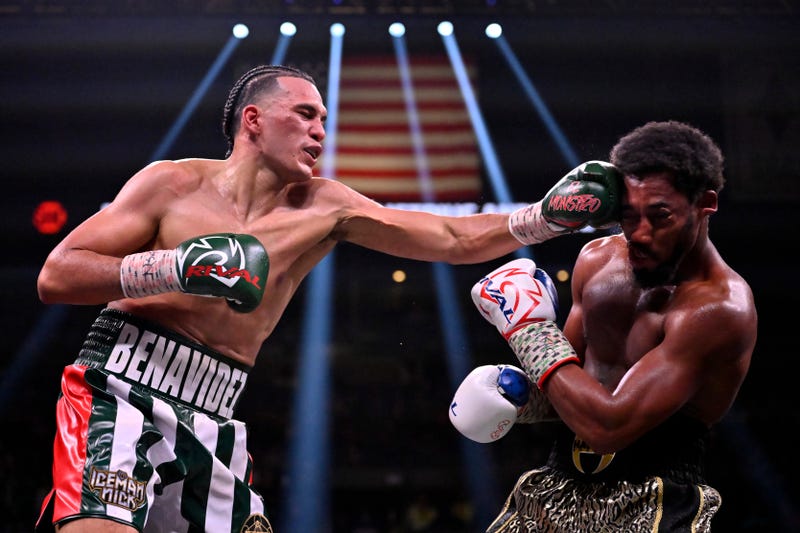 David Benavidez (L) fights Demetrius Andrade in a WBC super middleweight title fight at Michelob ULTRA Arena on November 25, 2023 in Las Vegas, Nevada.