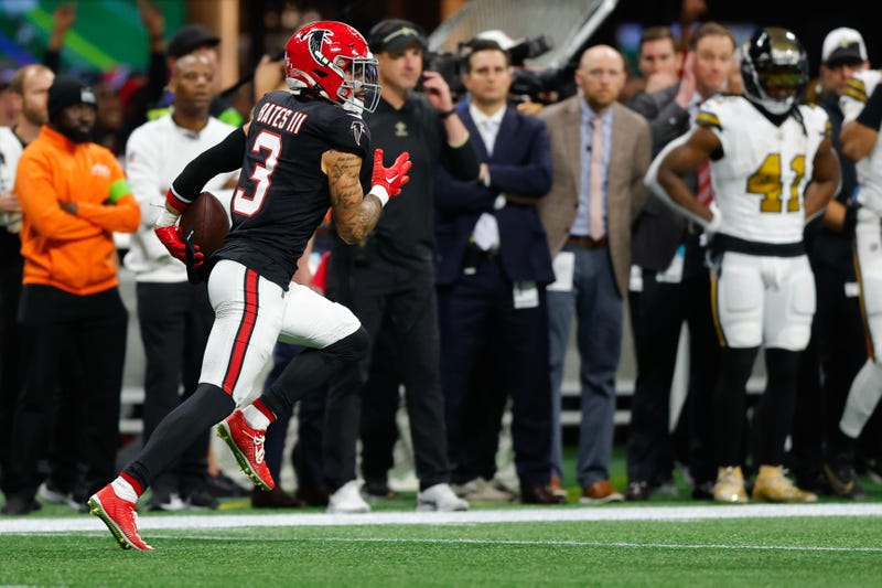 Jessie Bates III #3 of the Atlanta Falcons returns an interception for a touchdown in the first quarter of the game against the New Orleans Saints at Mercedes-Benz Stadium