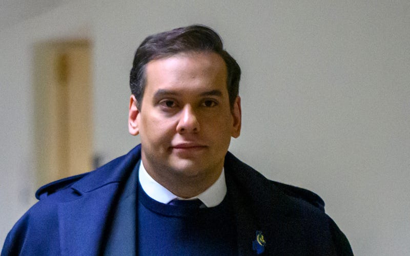 Then-Rep. George Santos, R-NY, walks from his office to the U.S. Capitol in Washington, DC, on Dec. 1, 2023