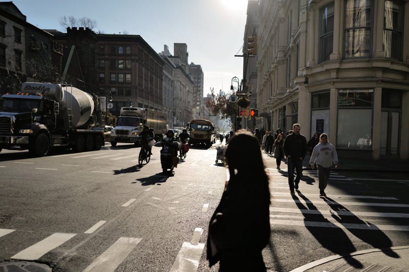 Pedestrians and traffic are seen in Manhattan this month