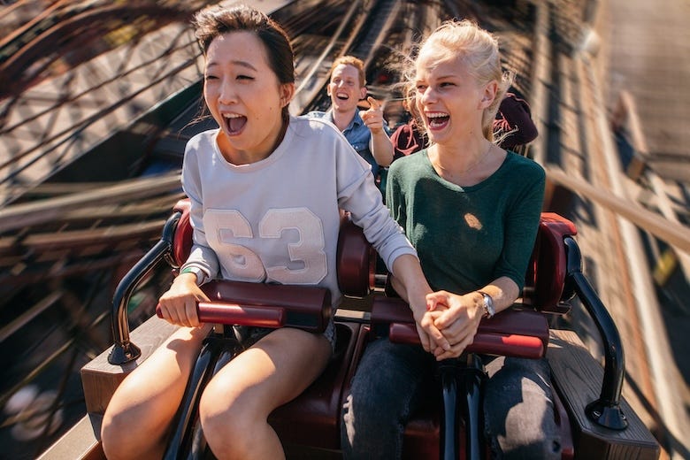 Women riding a roller coaster