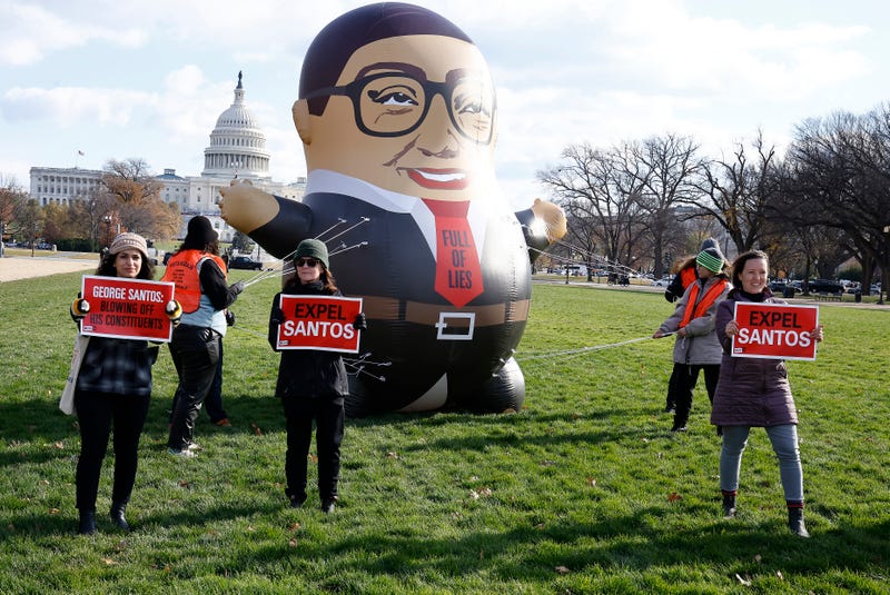 MoveOn debuts a 15-foot-tall inflatable of George Santos ahead of a possible vote to expel Santos from Congress on Capitol Hill on Nov. 28, 2023 in Washington, DC