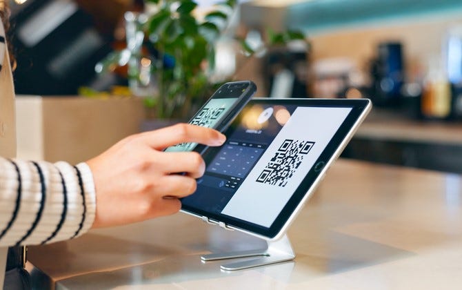 Hands, phone and pos in coffee shop, payment and fintech app with qr code, deal and services with scanning in store. People, smartphone and machine for point of sale, banking and barcode in cafeteria