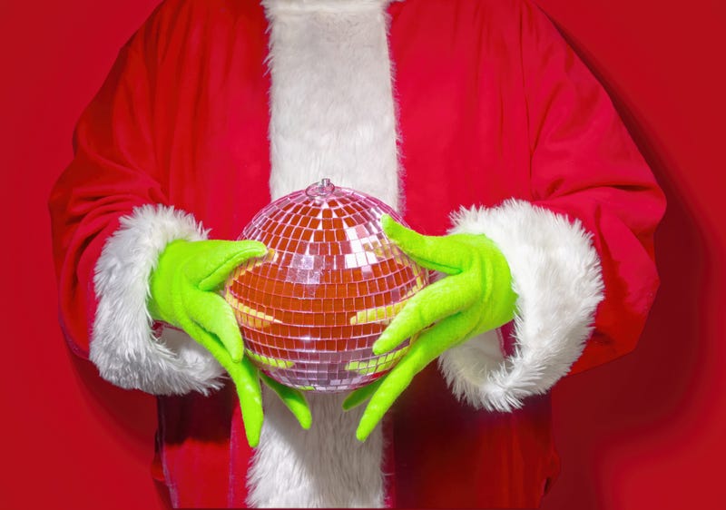 Christmas Grinch Holding a Disco Ball for the Holidays