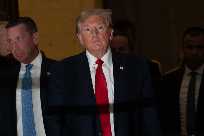 Former U.S. President Donald Trump returns from a court recess and speaks to the media during his trial in New York State Supreme Court on December 7, 2023 in New York City. Trump's civil fraud trial alleges that he and his two sons Donald Trump Jr. and Eric Trump conspired to inflate his net worth on financial statements provided to banks and insurers to secure loans. New York Attorney General Letitia James has sued seeking $250 million in damages. (Photo by David Dee Delgado/Getty Images)