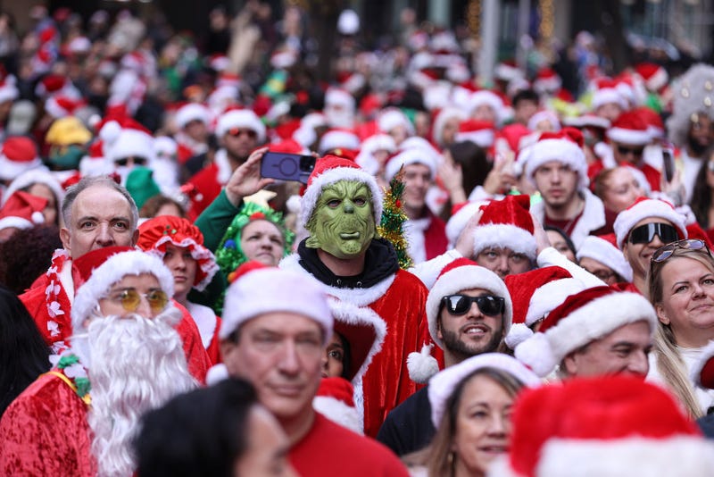 People dressed as Santa Claus in Manhattan for SantaCon 2023.
