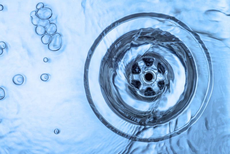 water rushing down drain
