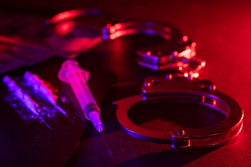 Drugs and handcuffs.