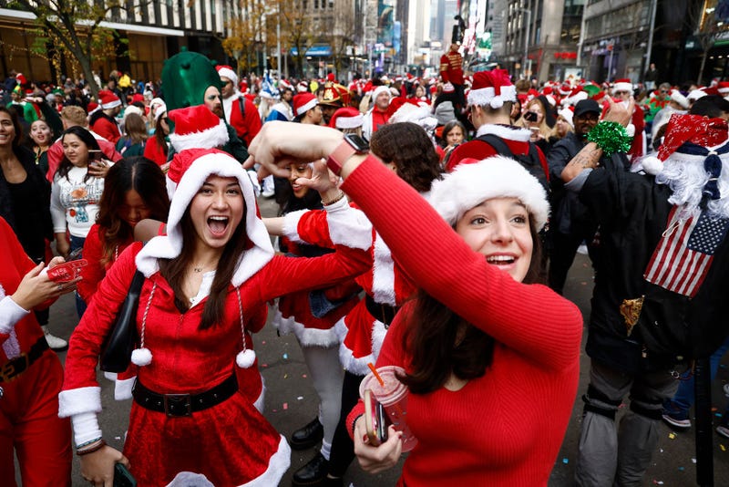 People dressed as Santa Claus in Manhattan for SantaCon 2023.