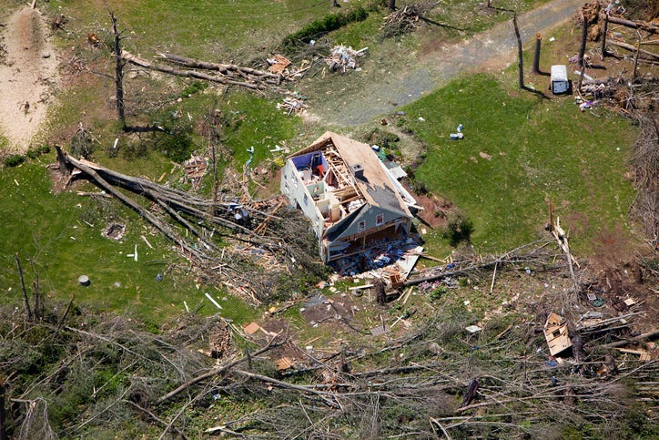Arial view of a home destroyed by a tornado.