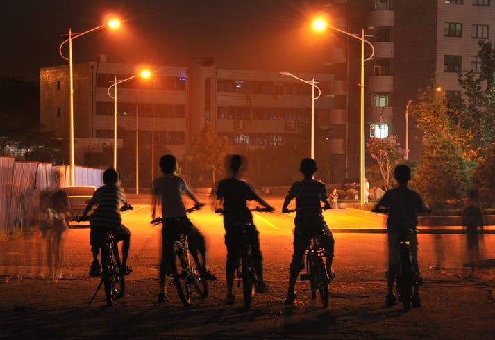 kids on bikes at night