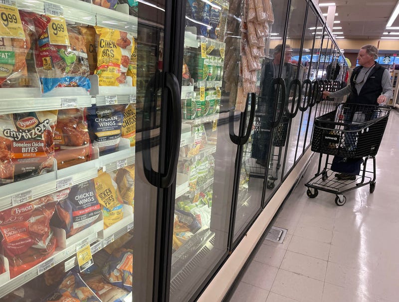  A customer shops for frozen food at a grocery store on December 12, 2023 in San Anselmo, California.