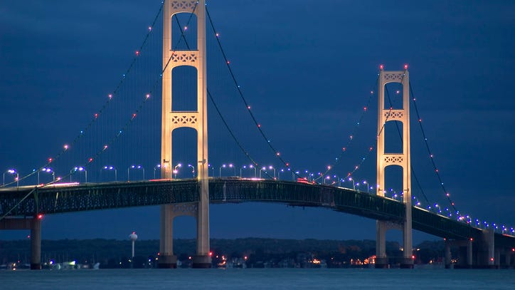 'Not a harmless stunt': State Police investigating after photos show man atop the Mackinac Bridge