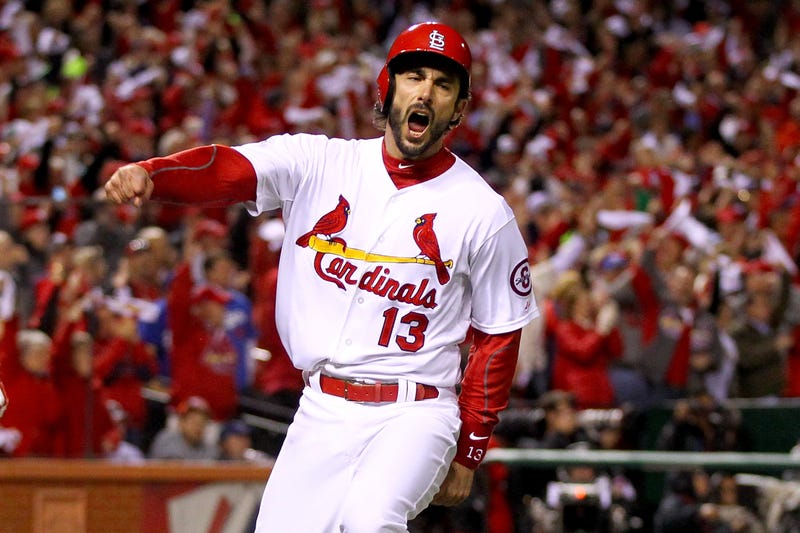 Matt Carpenter #13 of the St. Louis Cardinals reacts after scoring a run in the third inning against the Los Angeles Dodgers in Game Six of the National League Championship Series at Busch Stadium on October 18, 2013 in St Louis, Missouri.