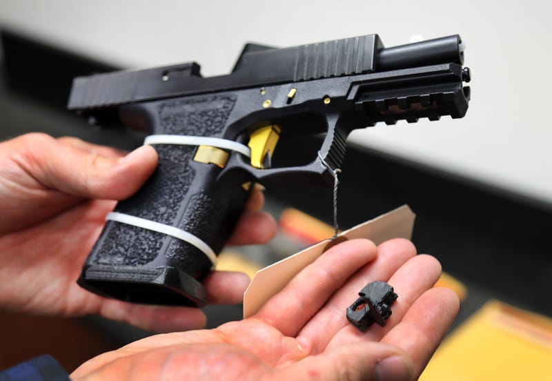 A machine gun conversion device for a Glock handgun was in custody of the ATF Boston Bureau. The device can convert the Glock into a machine gun after the "switch" is installed. It can be made with a 3-D printer.