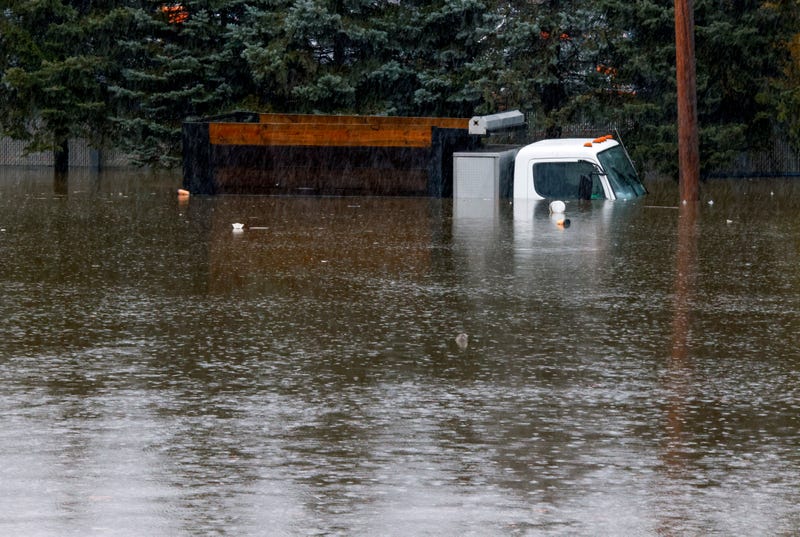 A truck is submerged in floodwater in Elmsford on Dec. 18, 2023