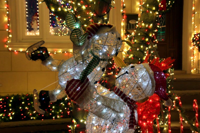 Homes include stunningly detailed displays, like this snowman family on Dec. 20, 2023