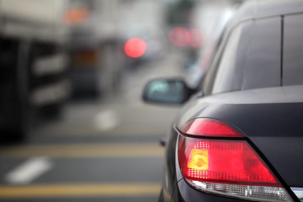 Brake light shining on a car