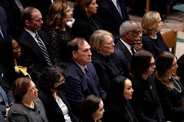 (L-R) U.S. Supreme Court Justice Elena Kagan; Justice Sonia Sotomayor; Justice Samuel Alito, Jr.; Virginia Thomas and husband Justice Clarence Thomas and Jane Sullivan, wife of Chief Justice John Roberts attend the funeral service for late retired Supreme Court Justice Sandra Day O'Connor at Washington National Cathedral on December 19, 2023 in Washington, DC. 
