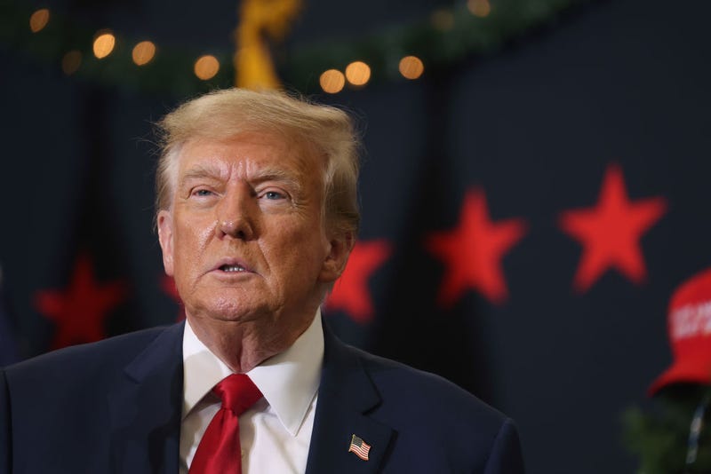 Republican presidential candidate and former U.S. President Donald Trump looks on during a campaign event on December 19, 2023 in Waterloo, Iowa. 