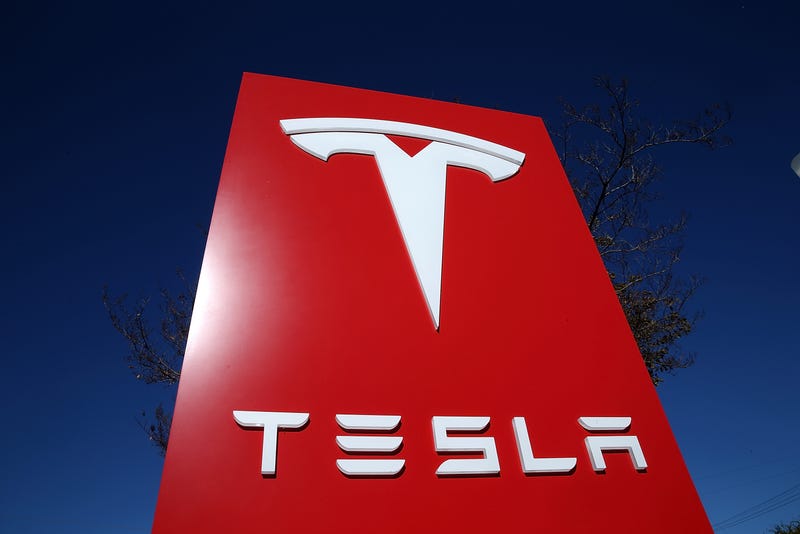 PALO ALTO, CA - NOVEMBER 05: A sign is posted at a Tesla showroom on November 5, 2013 in Palo Alto, California. Tesla will report third quarter earnings today after the closing bell.