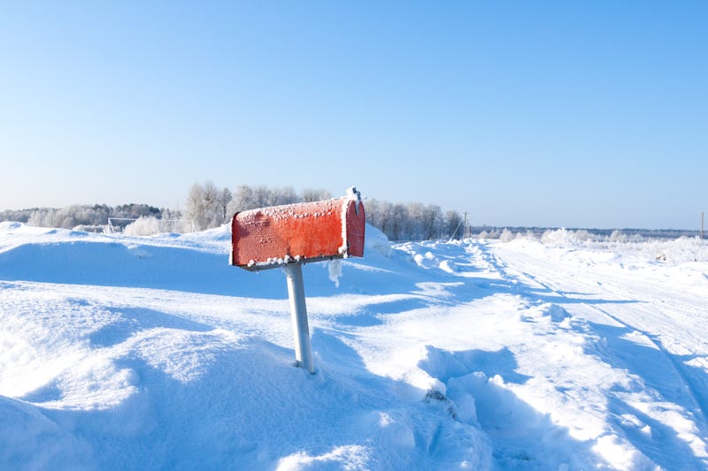 Mail box buried in snow